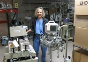 Dr. Peggy Schrieber is preparing gear to be shipped to a town in Zambia where there is no running water, no indoor plumbing, and no electricity.